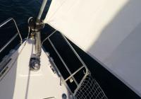 sailing yacht roll genoa front sail bow sailboat windlass anchor